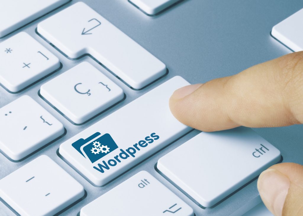 image closeup of a keyboard with a wordpress button